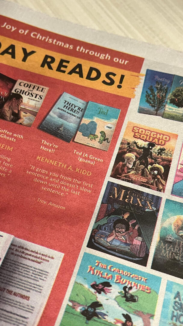 Provided press photo showing Curious Maxx featured in a holiday reads print spread